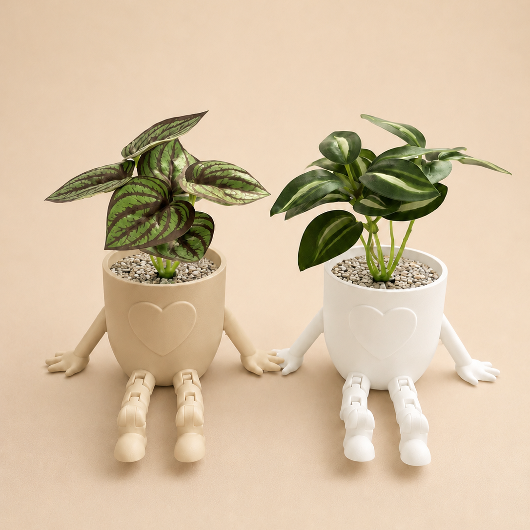 Sitzender Blumentopf mit Herz