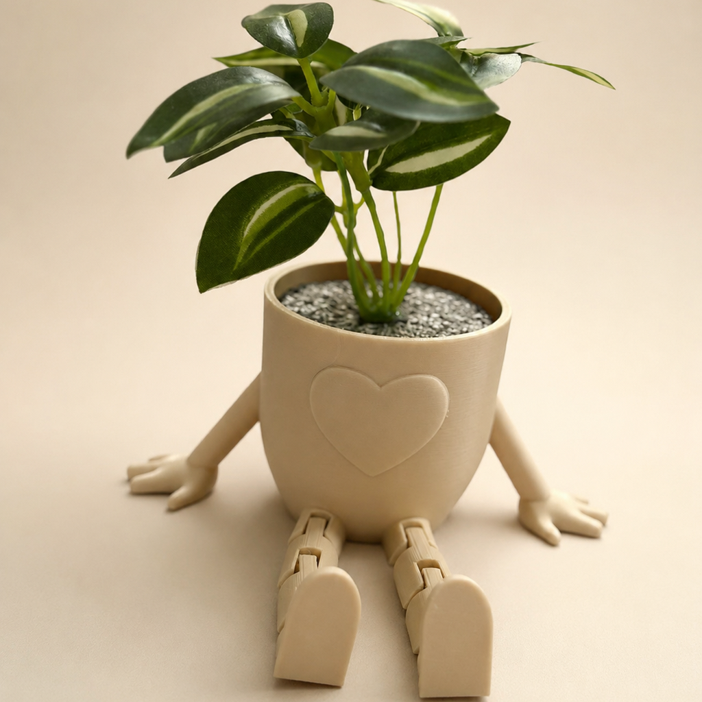 Sitzender Blumentopf mit Herz